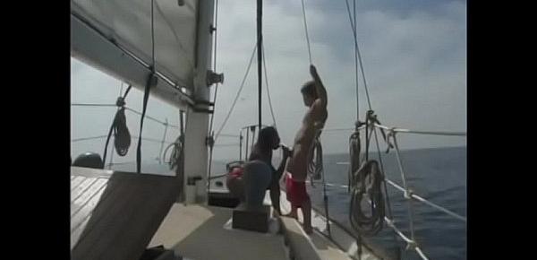  White guy fucks ebony chick with a big ass on a boat
